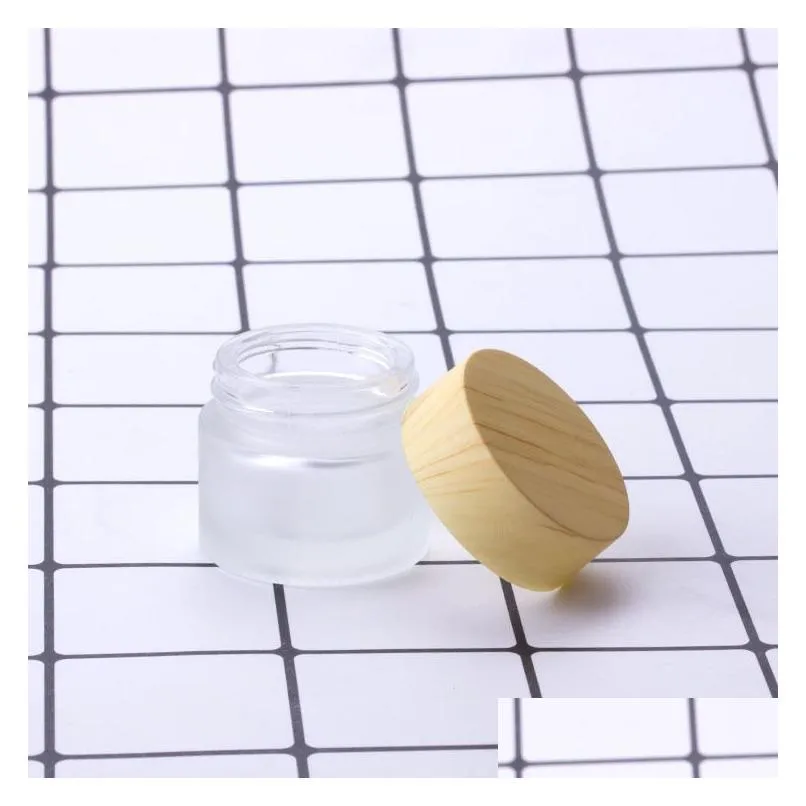 wholesale frosted glass jar cream bottles round cosmetic jars hand face packing bottle 5g 10g 15g 30g 50g with wood cover