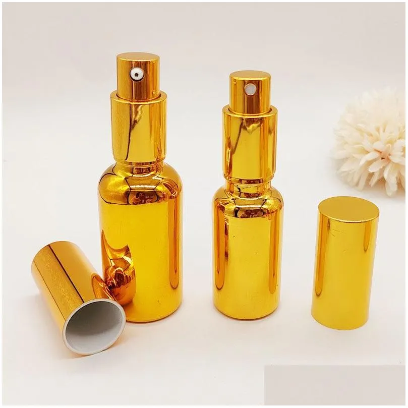 Packing Bottles Wholesale 100Ml Gold Pump Cosmetic Glass  Oil Per Bottles With Spray For Personal Care Drop Delivery Office S Otcvn