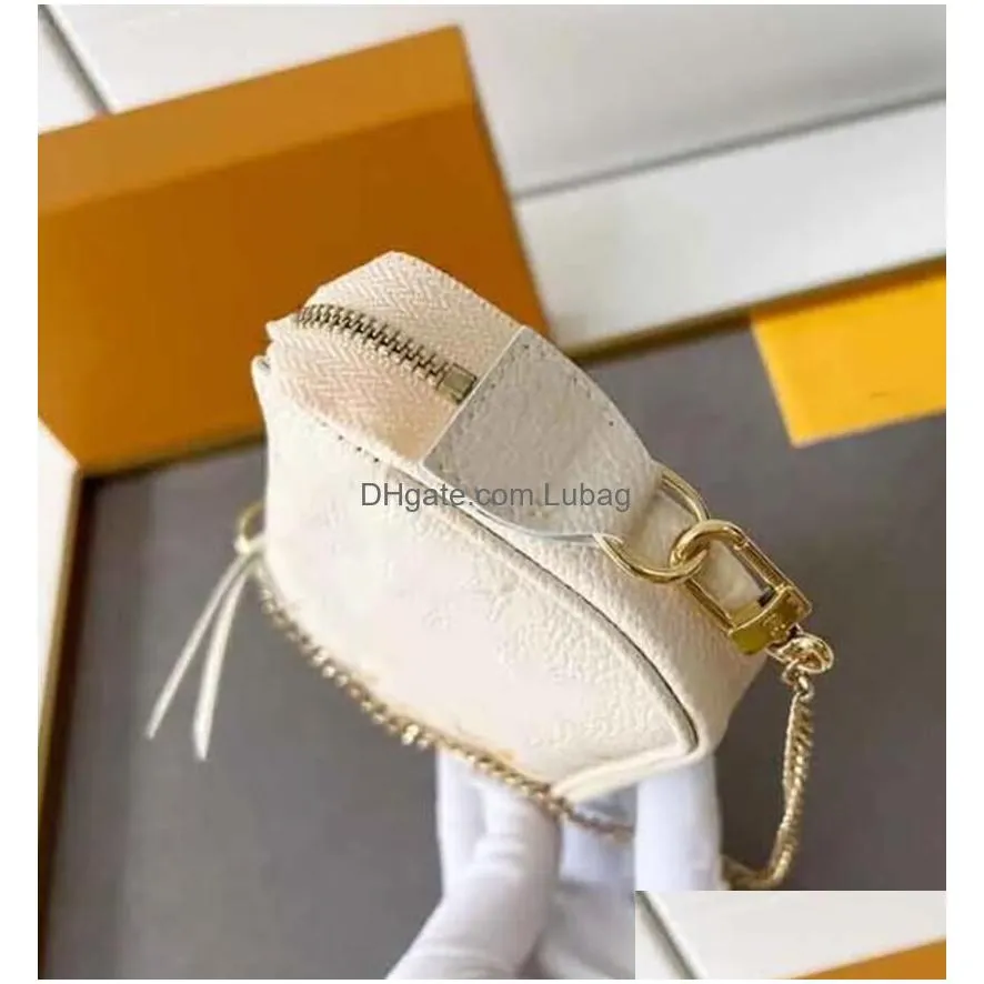 designer bag ladies mini pochette accessoires hand pack full leather embossed silk screen chain mahjong bag m80501