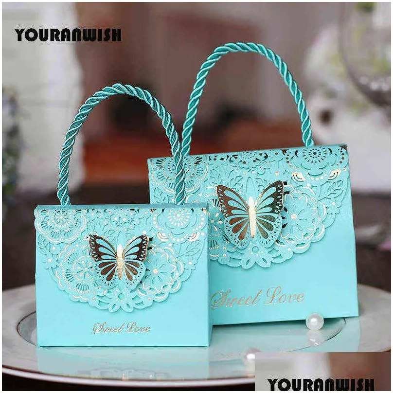 50pcs/lot high-quality laser cut butterfly flower gift bags candy boxes wedding favors portable gift box party favor decoration h1231