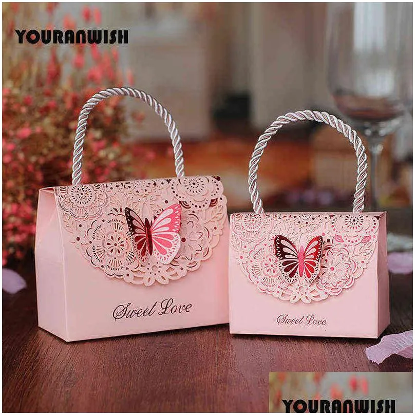 50pcs/lot high-quality laser cut butterfly flower gift bags candy boxes wedding favors portable gift box party favor decoration h1231