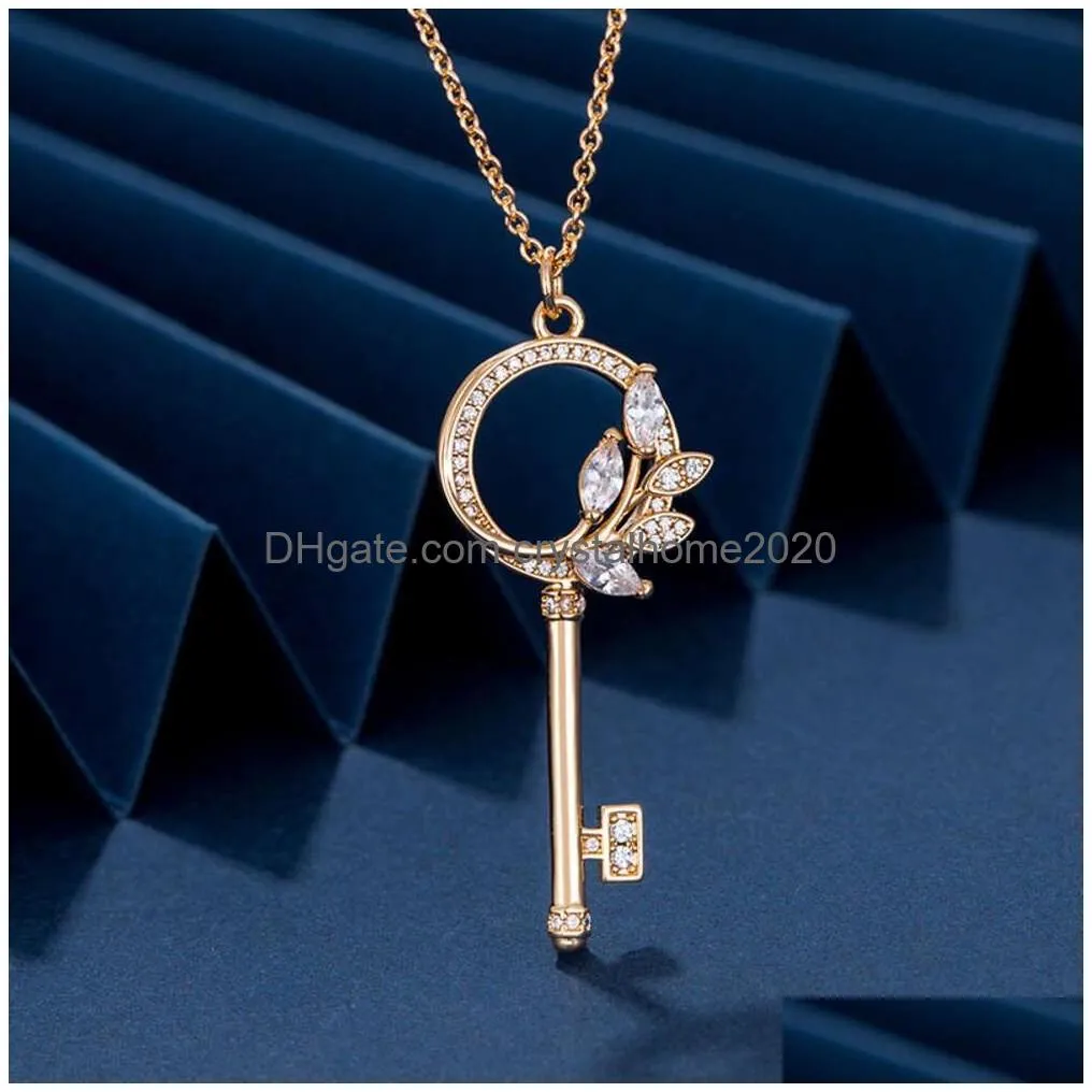 Anyv Gold T Family Vine Key Necklace Female Flower Leaf Simple And Luxury Horse Eye Diamond Sweater Drop Delivery Dhjji