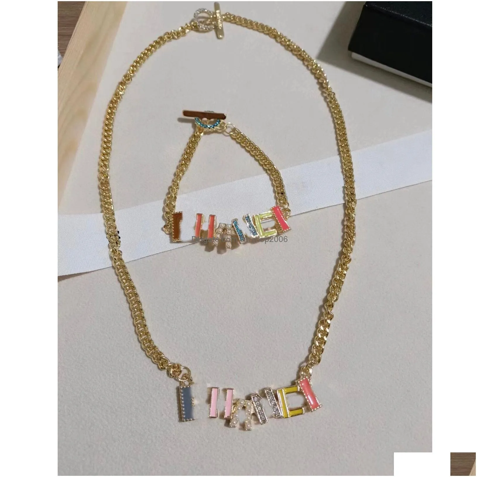 fashion designer 18k gold plated curb chain pendant necklaces luxury brand letter geometric chain bracelet bangle crystal pearl wristband womens necklace