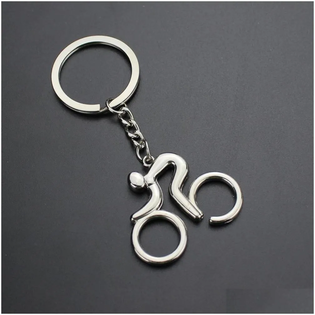 Key Rings 20Pcs/Lot Metal Riding Bicycle Keychain Fashion Sports Key Chains Cool Man Bag Pendants Charm Female Accessory Jewelry Whol Dh8Cy