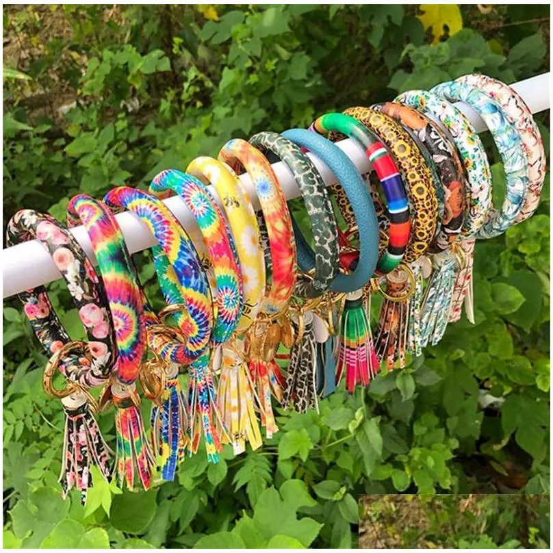 fashion multiple styles sun flower/flag pattern key chain leather wrap tassels bracelets keychain wristlet bracelet tassel keychains round bangle
