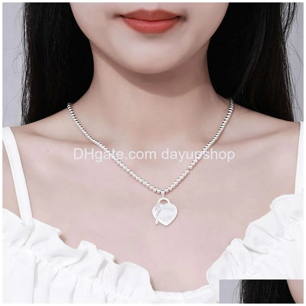 Pendant Necklaces Designer High Quality T Family Necklace Womens Long Thick Chain Fashion Jewelry Heart-Shaped Drop Delivery Dhqp7