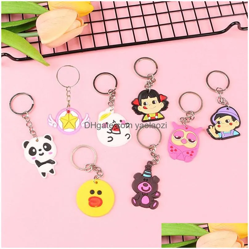 wholesale cartoon keychain 100pcs anime ainimal keyring key purse handbag silicone pvc cute key chain gift for women girl kids random model souvenir small