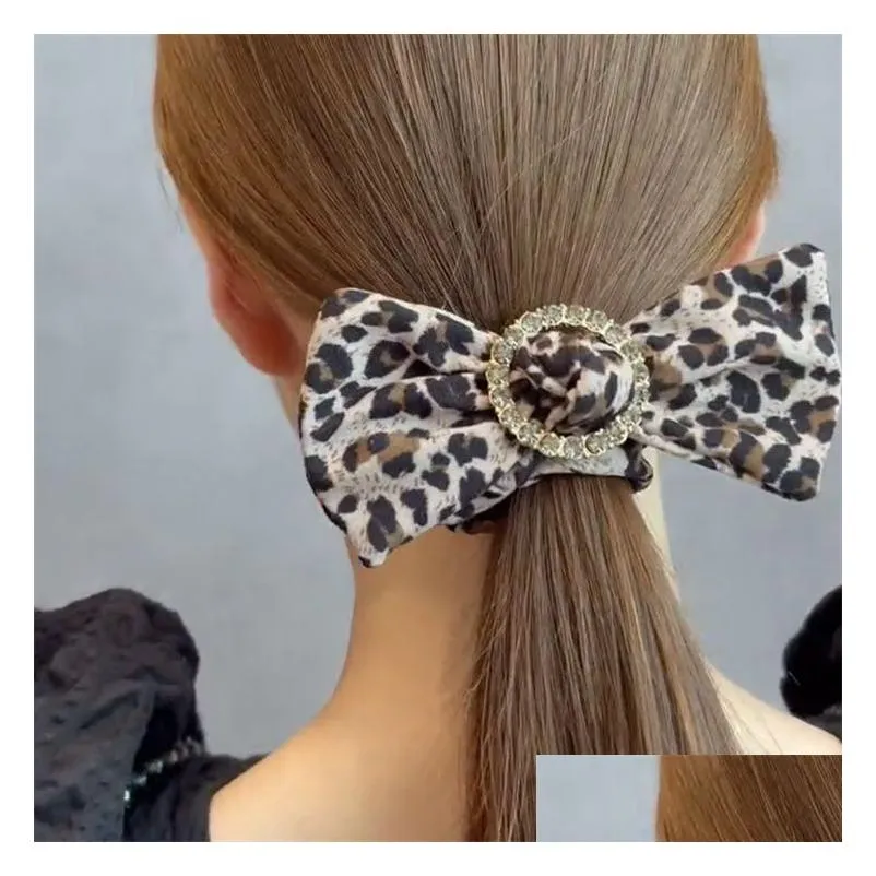 autumn and winter new round buckle drill bow leopard hair circle czech diamond boutique quality leather band hair rope