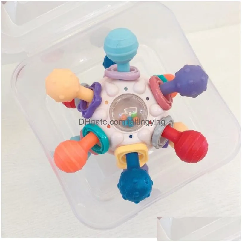  5.7cm stock soft rubber baby handbell toy baby grasping training can bite silicone gum ball puzzle early education 3-12 months