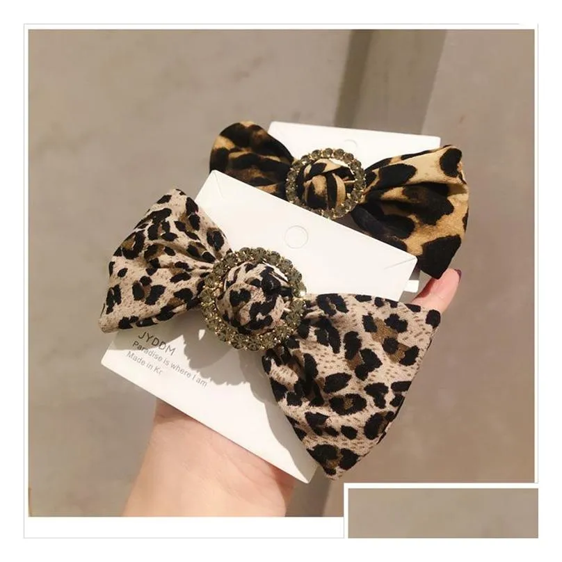 autumn and winter new round buckle drill bow leopard hair circle czech diamond boutique quality leather band hair rope