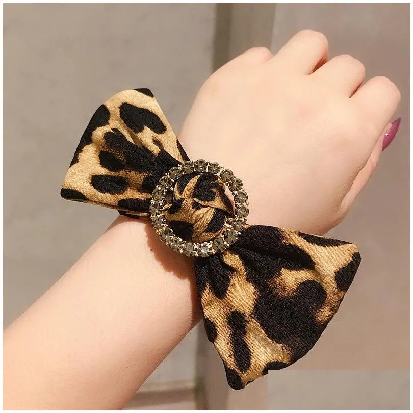 autumn and winter new round buckle drill bow leopard hair circle czech diamond boutique quality leather band hair rope