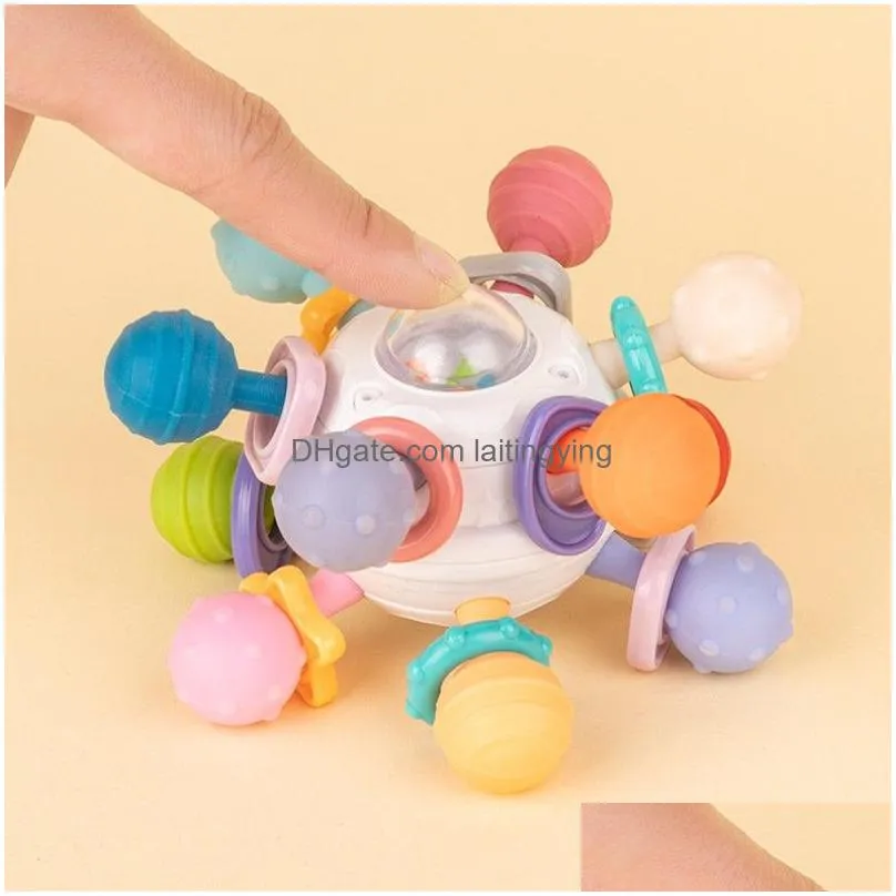  5.7cm stock soft rubber baby handbell toy baby grasping training can bite silicone gum ball puzzle early education 3-12 months