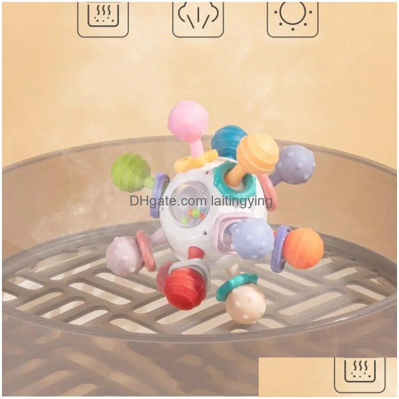  5.7cm stock soft rubber baby handbell toy baby grasping training can bite silicone gum ball puzzle early education 3-12 months