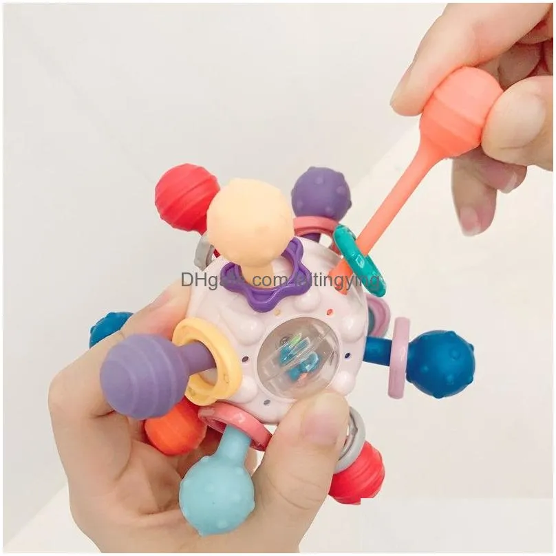  5.7cm stock soft rubber baby handbell toy baby grasping training can bite silicone gum ball puzzle early education 3-12 months