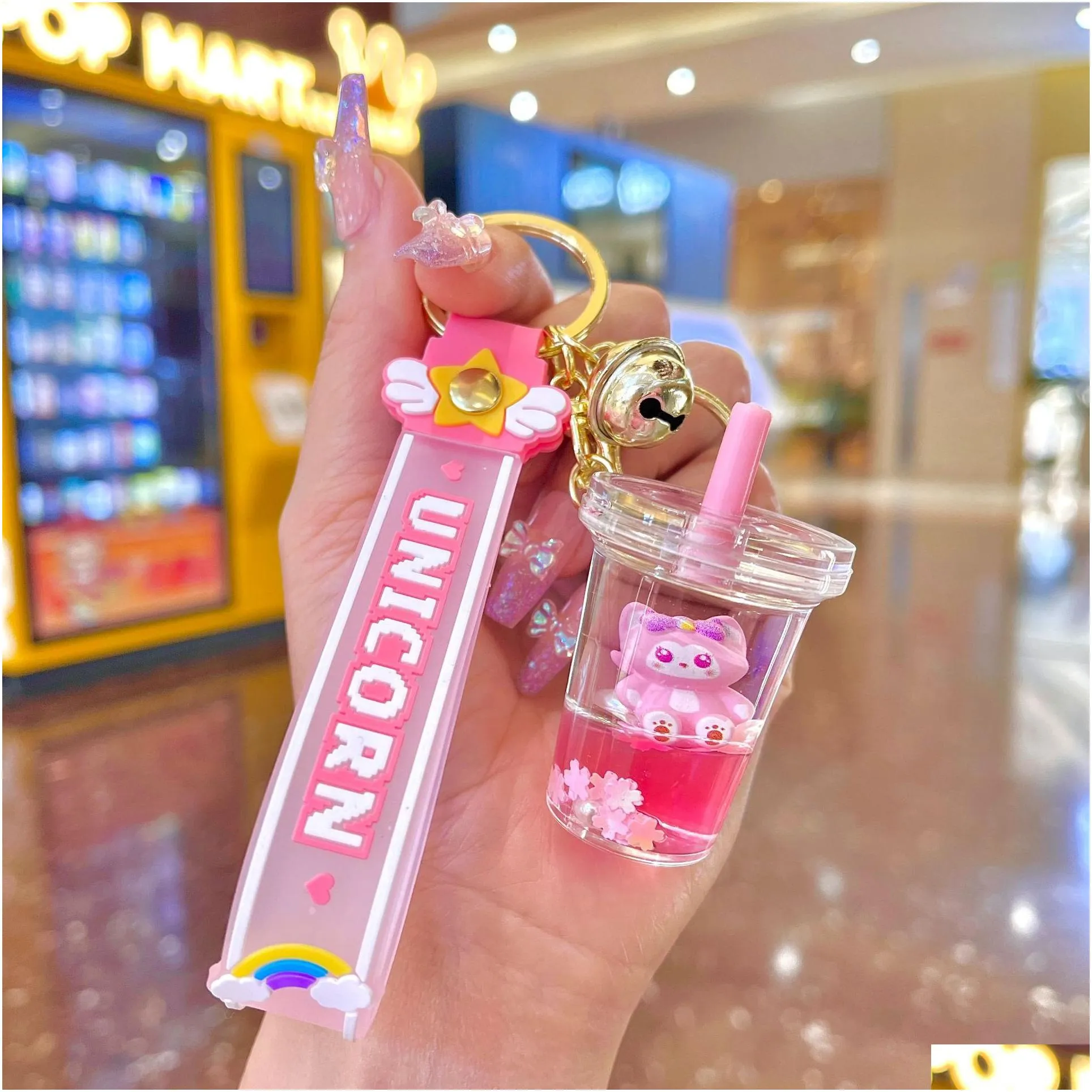 pink glow keychain creative flowing sand bottle keychain women`s bag pendant car keychain small jewelry cute gift wholesale