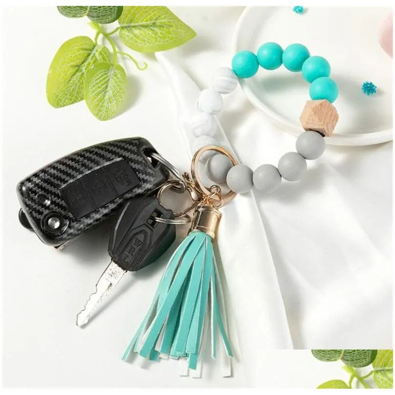 14 colors wooden tassel bead string bracelet keychain food grade silicone beads bracelets women girl key ring wrist strap db961