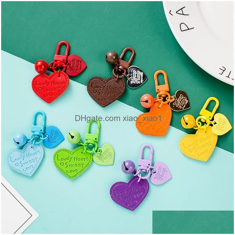 party favor engraved heart pendant keychain alloy bell key chain creative pu leather backpack pendants t9i002552