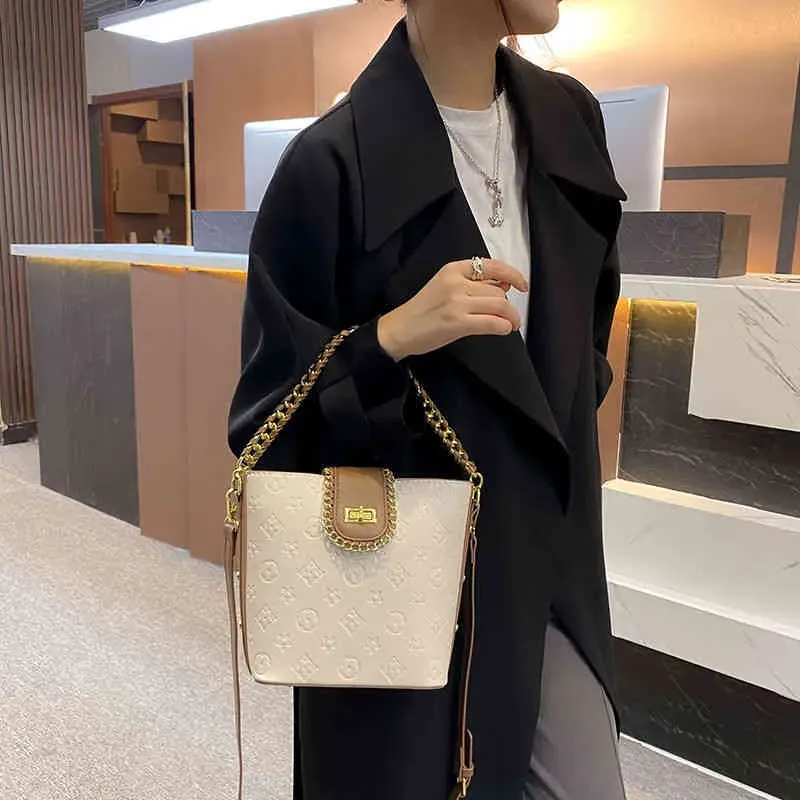 2023 Designer bag Super Small female net red  print chain bag Japan and South Korea versatile texture one shoulder Bucket Bag