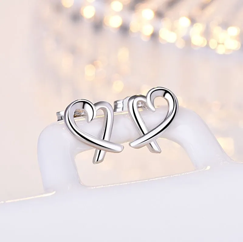 Simple Design Silver Color Hollow Heart Dangle Earrings For Women New Brand Fashion Ear Cuff Piercing Drop Earring Gift