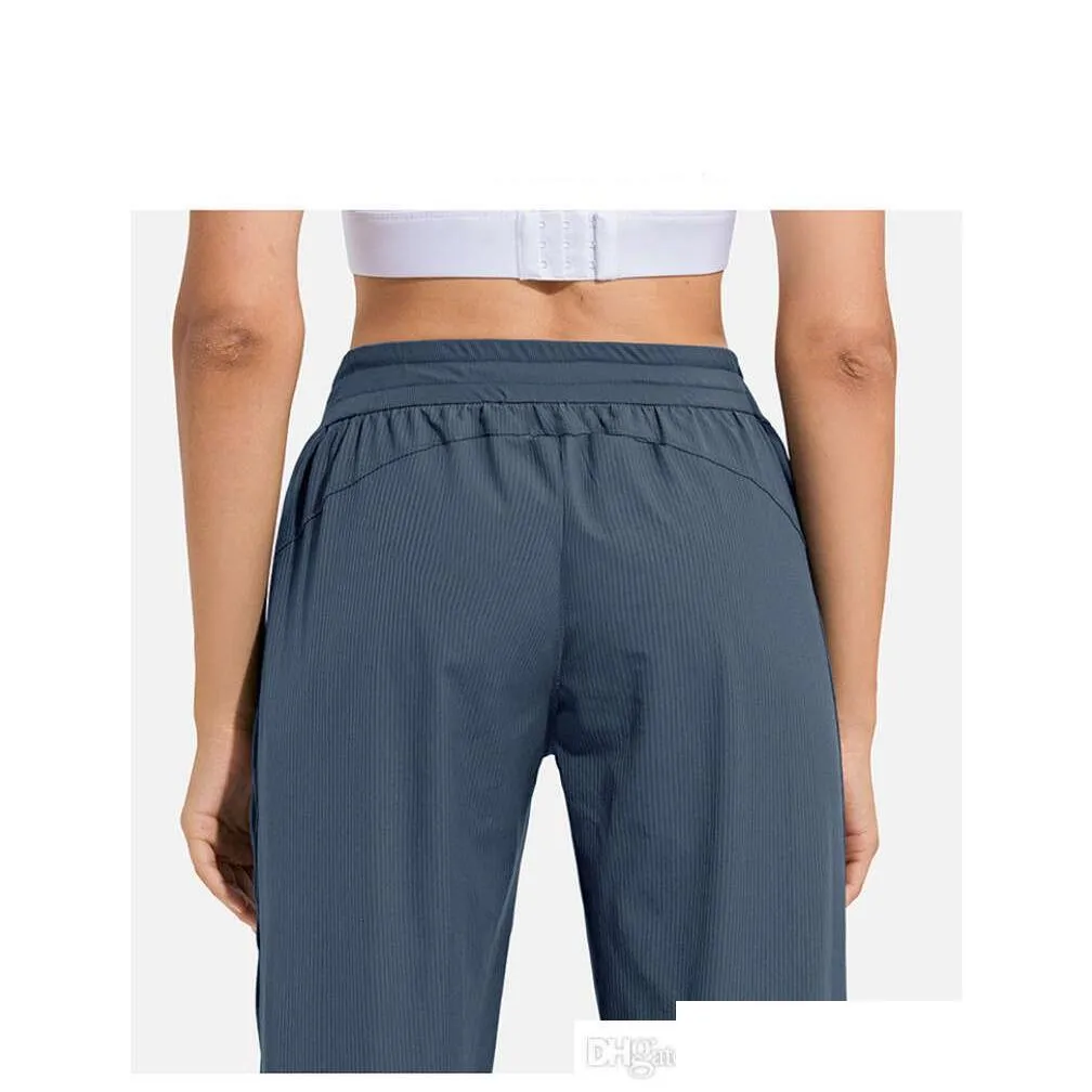 LL Women Jogging Yoga Ninth Pants Pocket Fitness Leggings Soft High Waist Hip Lift Elastic Casual Pants Drawstring Legs Sweatpants2344