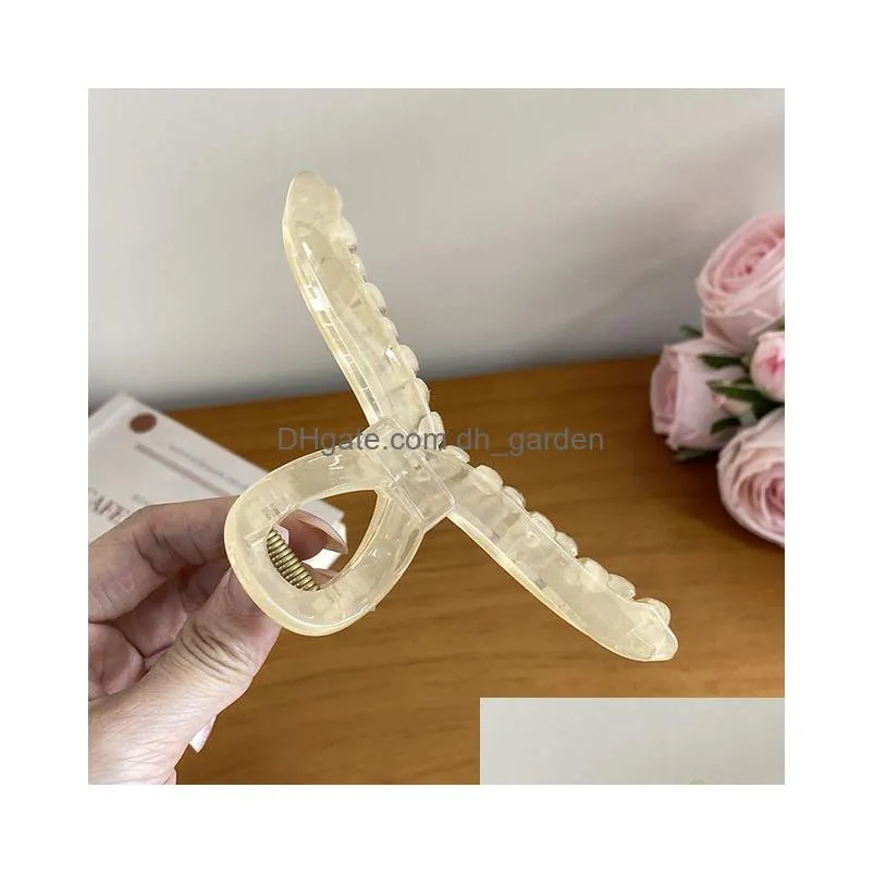 Clamps 2023 New Arrived 12.6Cm Oversized Ribbon Twisted Hollow Hair Claw Clips Fashion Plastic Jelly Color Shark Clip For D Dhgarden Dh2Si