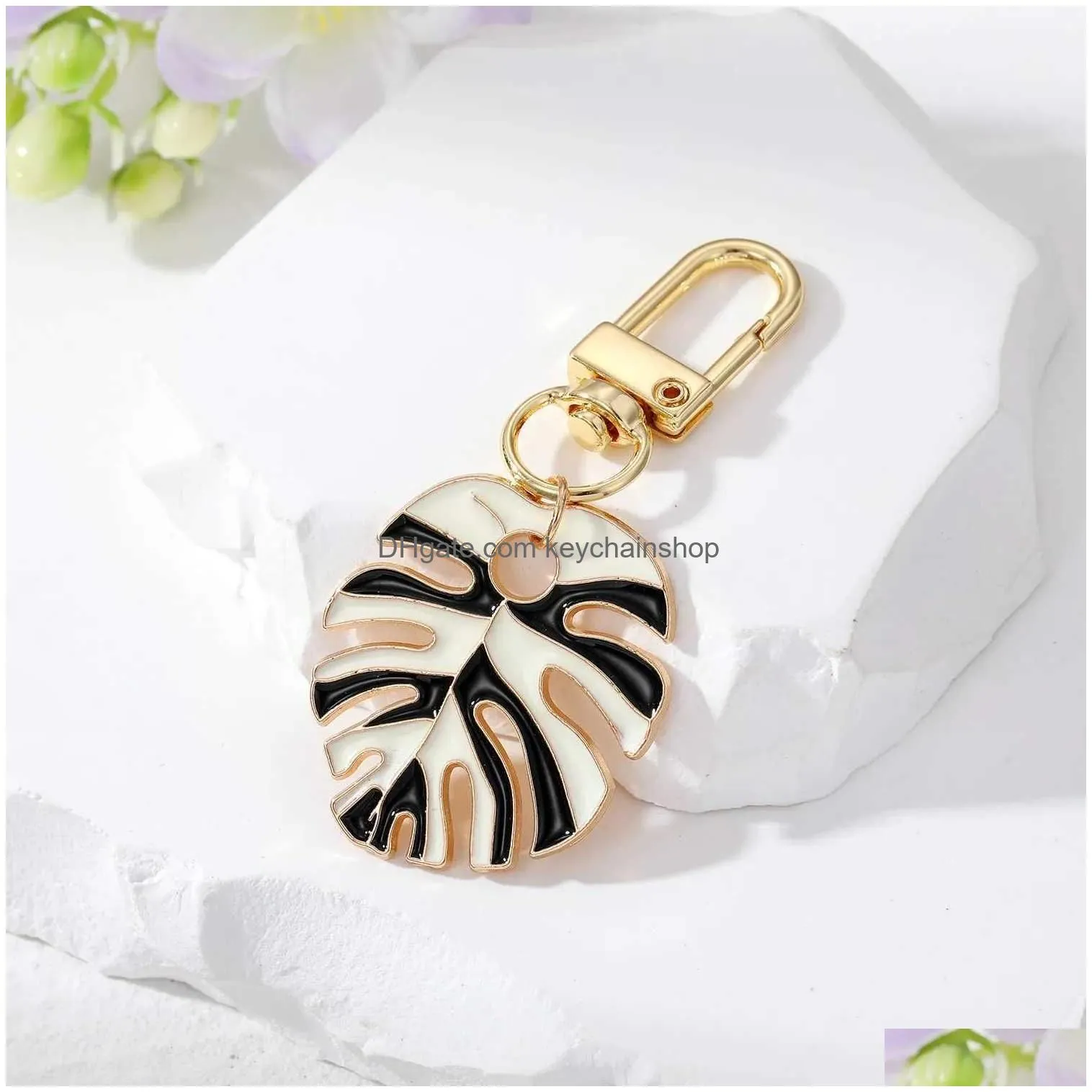 Keychains & Lanyards Colorf Leaf Style Metal Pendant Key Chains Rotationable Clasp Keyring Keychain Women Bag Jewelry R231003 Drop De Dhuxs