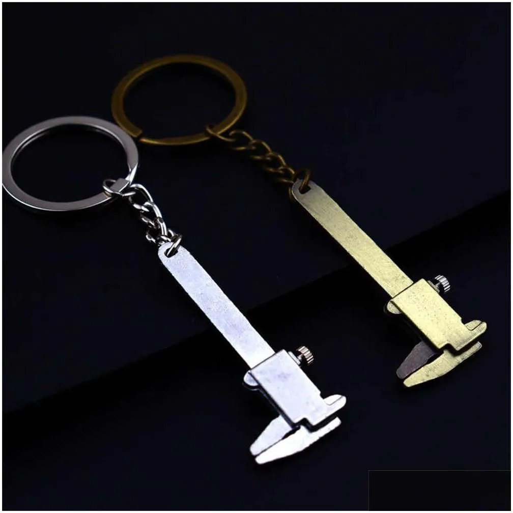 Keychains & Lanyards Cute Mini Caliper Tools Keychain Zinc Alloy Vernier Key Chains S Measuring Gauging Accessories Rers L230314 Drop Dhiv1