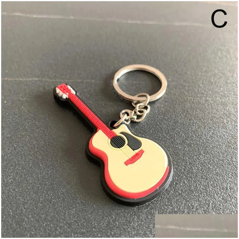Keychains & Lanyards Fashion Classic Guitar Chain Car Sile Ring Sical Instruments Pendant Accessories For Man Women Gift L230314 Drop Dhwoc