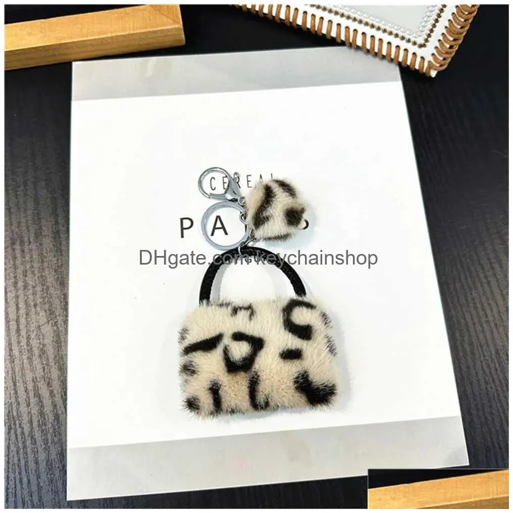 Keychains & Lanyards P Leopard Print Wallets Keyring For Women Cartoon Coin Purses With Keychain Mini Earphone Bag Ornaments Gift Dro Dheuz