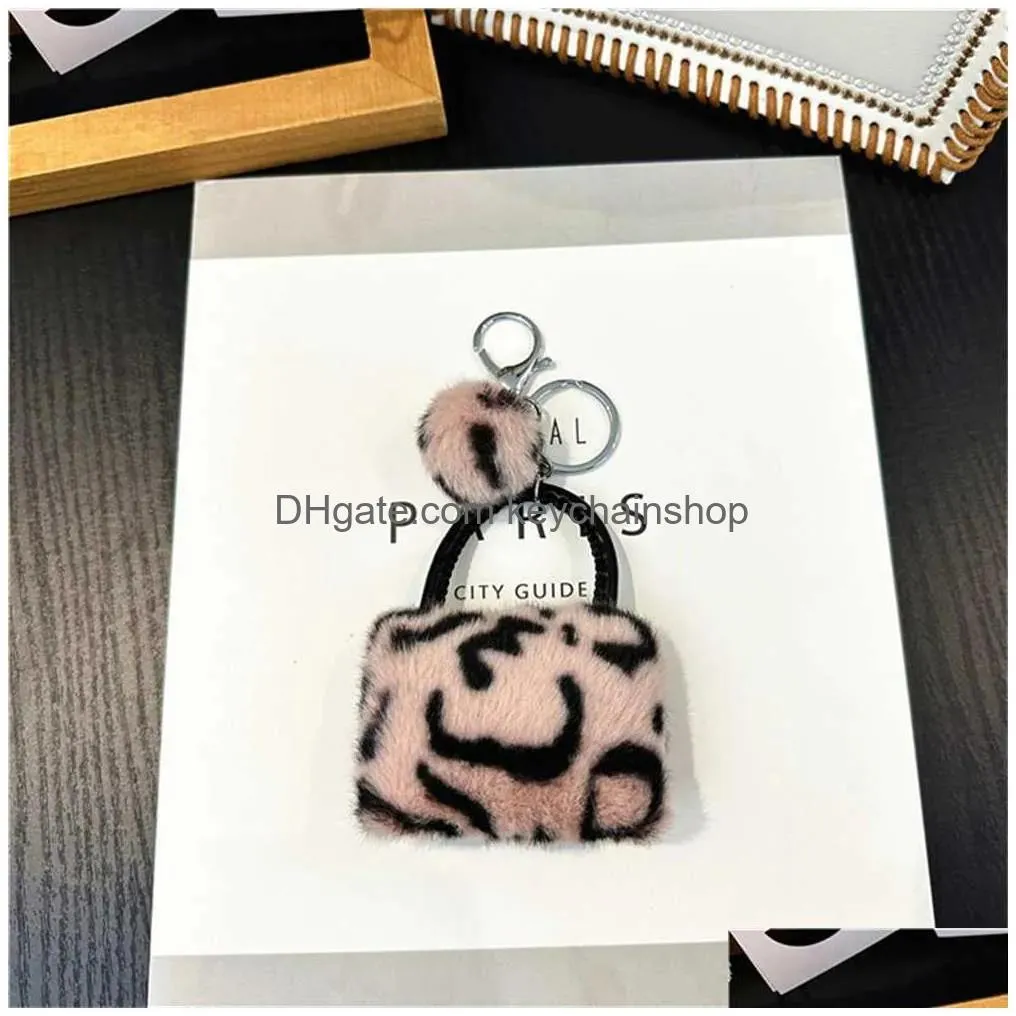 Keychains & Lanyards P Leopard Print Wallets Keyring For Women Cartoon Coin Purses With Keychain Mini Earphone Bag Ornaments Gift Dro Dheuz