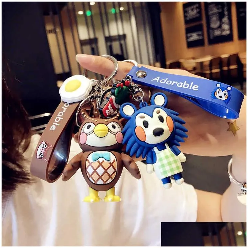 Key Rings Animal Crossing Keychain Doll Car Chain Isabelle Kk Nook Figures Toy Pendant Small Cute Keyring Accessories For Gift Drop D Dhhdu
