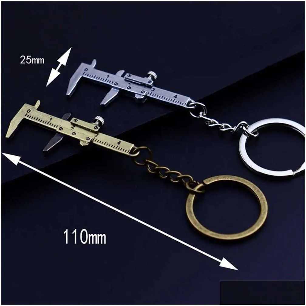 Keychains & Lanyards Cute Mini Caliper Tools Keychain Zinc Alloy Vernier Key Chains S Measuring Gauging Accessories Rers L230314 Drop Dhiv1