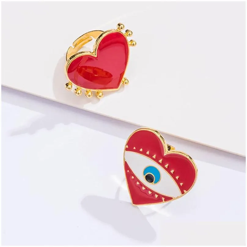 With Side Stones European And American Fashion Enamed Red Heart Love Ring Creative 18K Glod Evil Eye Adjustable Jewelry Drop Delivery Dhg0S