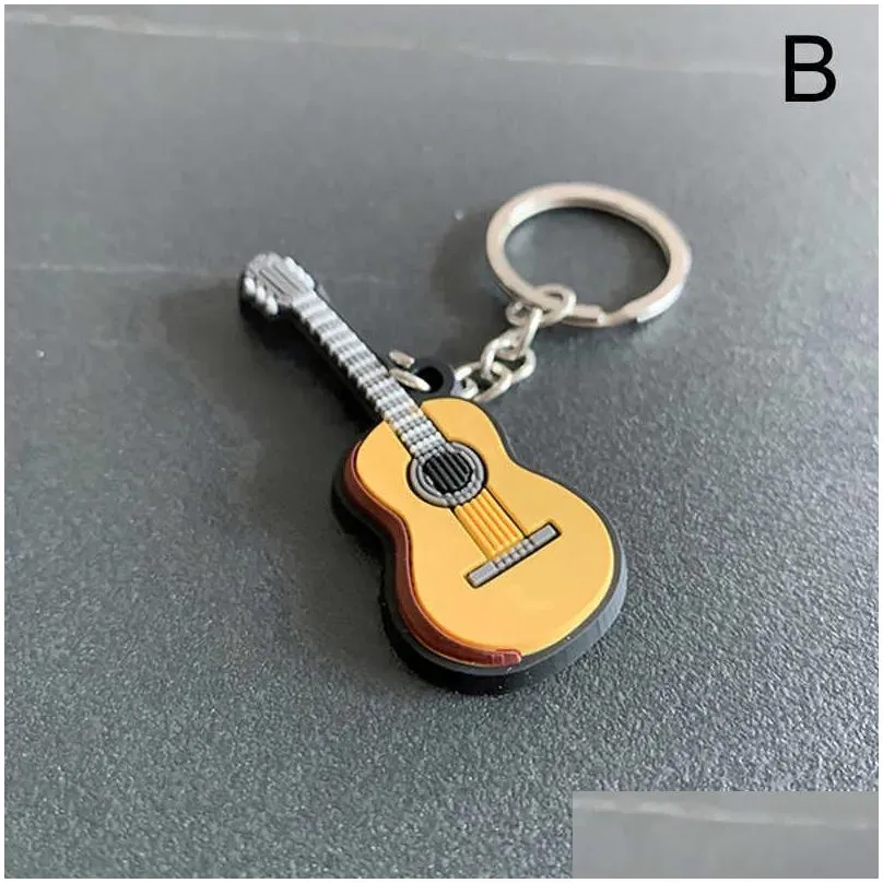 Keychains & Lanyards Fashion Classic Guitar Chain Car Sile Ring Sical Instruments Pendant Accessories For Man Women Gift L230314 Drop Dhwoc