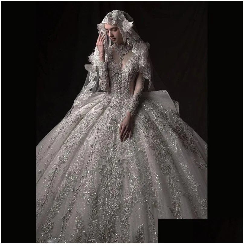 A-Line Wedding Dresses 2024 Arabic Long Sleeves Beaded Pearls Crystals Sequined Satin Bridal Gowns Luxury Dubai Empire Ball Gown Princ Otbtf