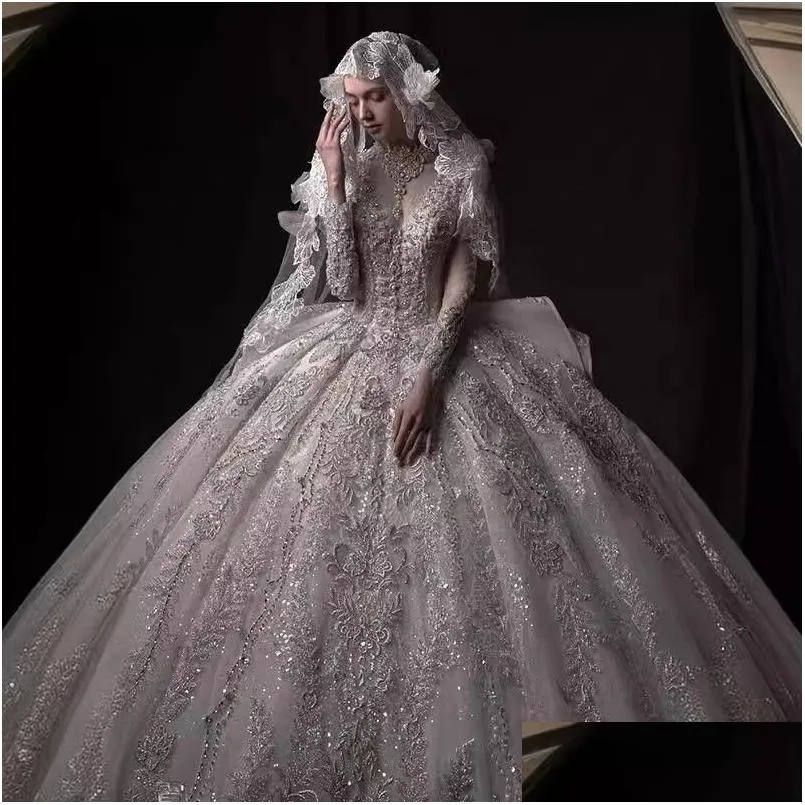 A-Line Wedding Dresses 2024 Arabic Long Sleeves Beaded Pearls Crystals Sequined Satin Bridal Gowns Luxury Dubai Empire Ball Gown Princ Otbtf