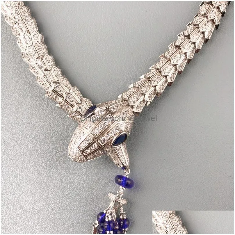 designer collection style dinner party choker neckhole necklace earrings settings full diamond blue beads tassel pendant snake serpent snakelike jewelry