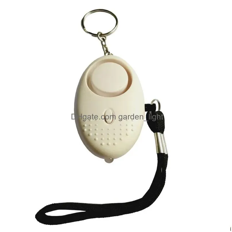 wholesale party supplies 130db egg shape self defense alarm keychain pendant personalize flashlight personal safty key chain charm car