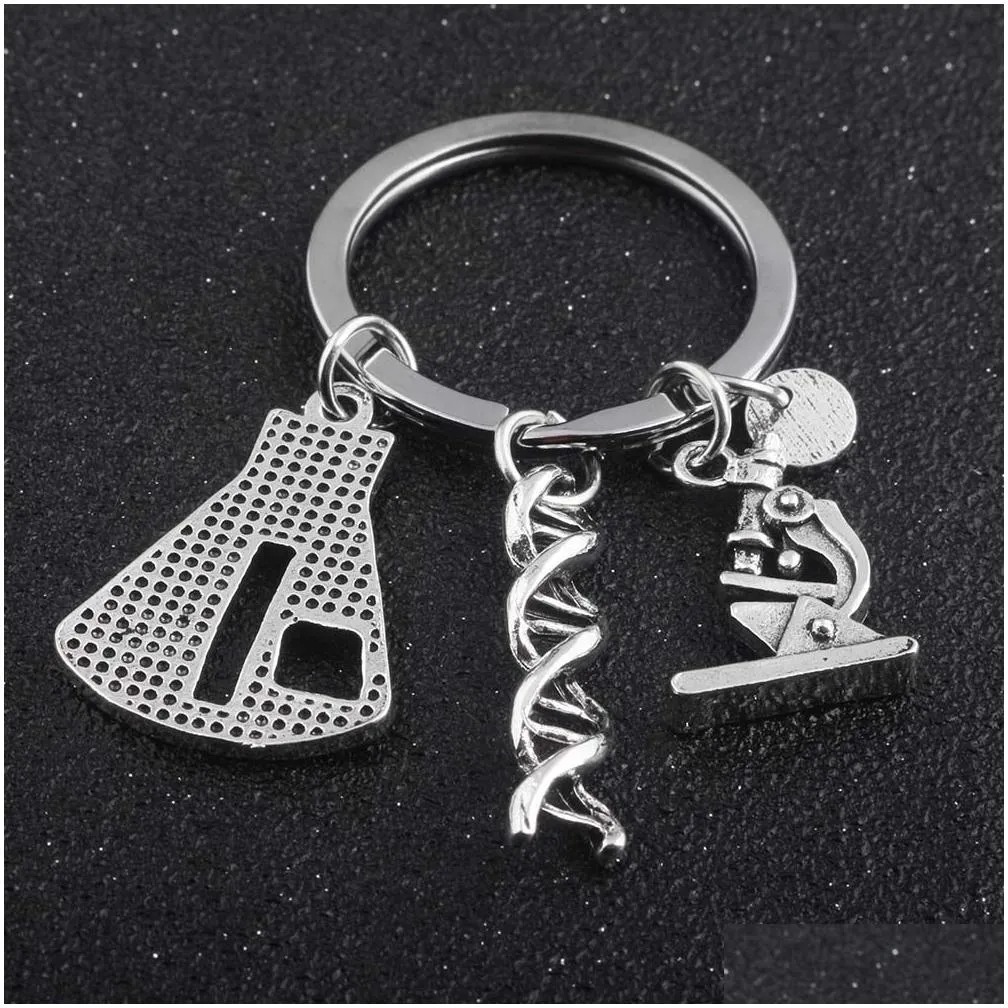 Keychains & Lanyards Sg Newest Biological Experimental Tool Key Chains Conical Flask Molecar Dna Microscope Pendant Keychain Drop Del Dhbmd