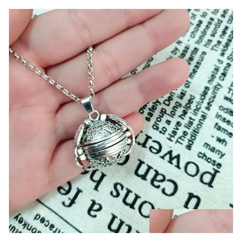 Other Jewelry Sets New Magic Po Pendant Memory Floating Expanding Locket Necklace Plated Angel Wings Flash Box Fashion Album Necklace Dhzv3