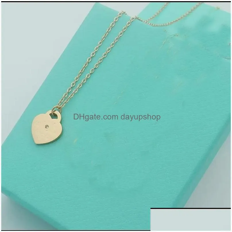Pendant Necklaces Designer Necklace Luxury Jewlery For Women Womens Jewelry Classic Stainless Steel Heart Shaped Key Drop Delivery Pen Dho9D