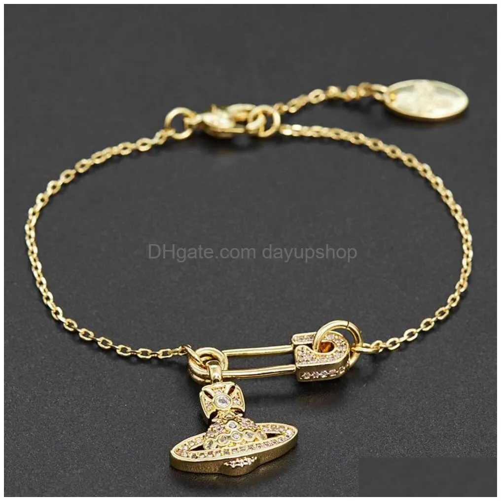 Beaded Designer High Quality Empress Dowager Xis Diamond Studded Pin Fine Chain Niche Design Fashionable Planet Bracelet Female Drop Dhlp0