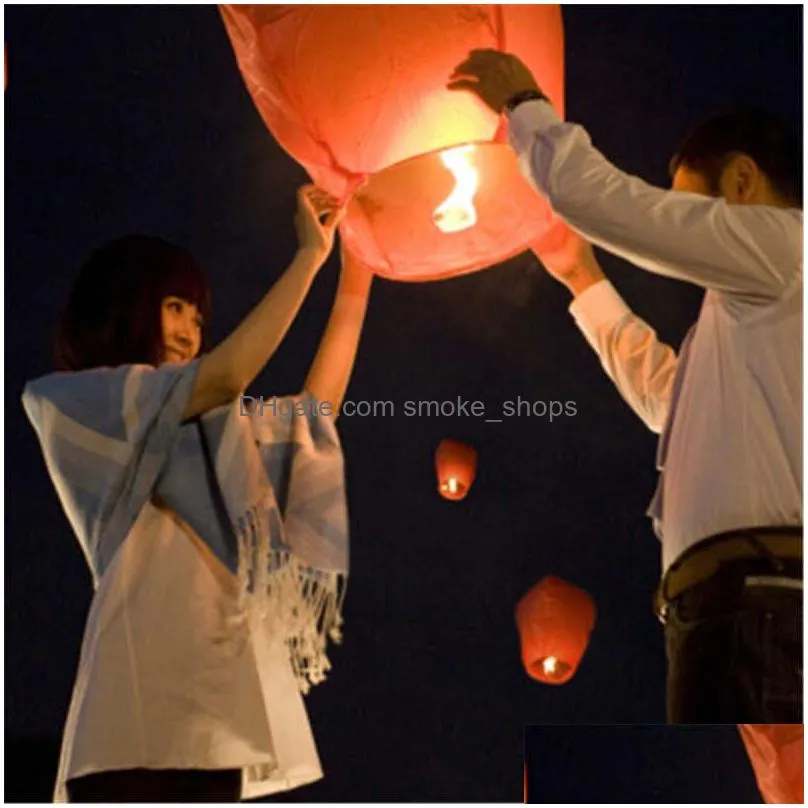  103050pcslot diy chinese sky paper flying ing lanterns fly candle lamps christmas wedding birthday party decoration h10209721558