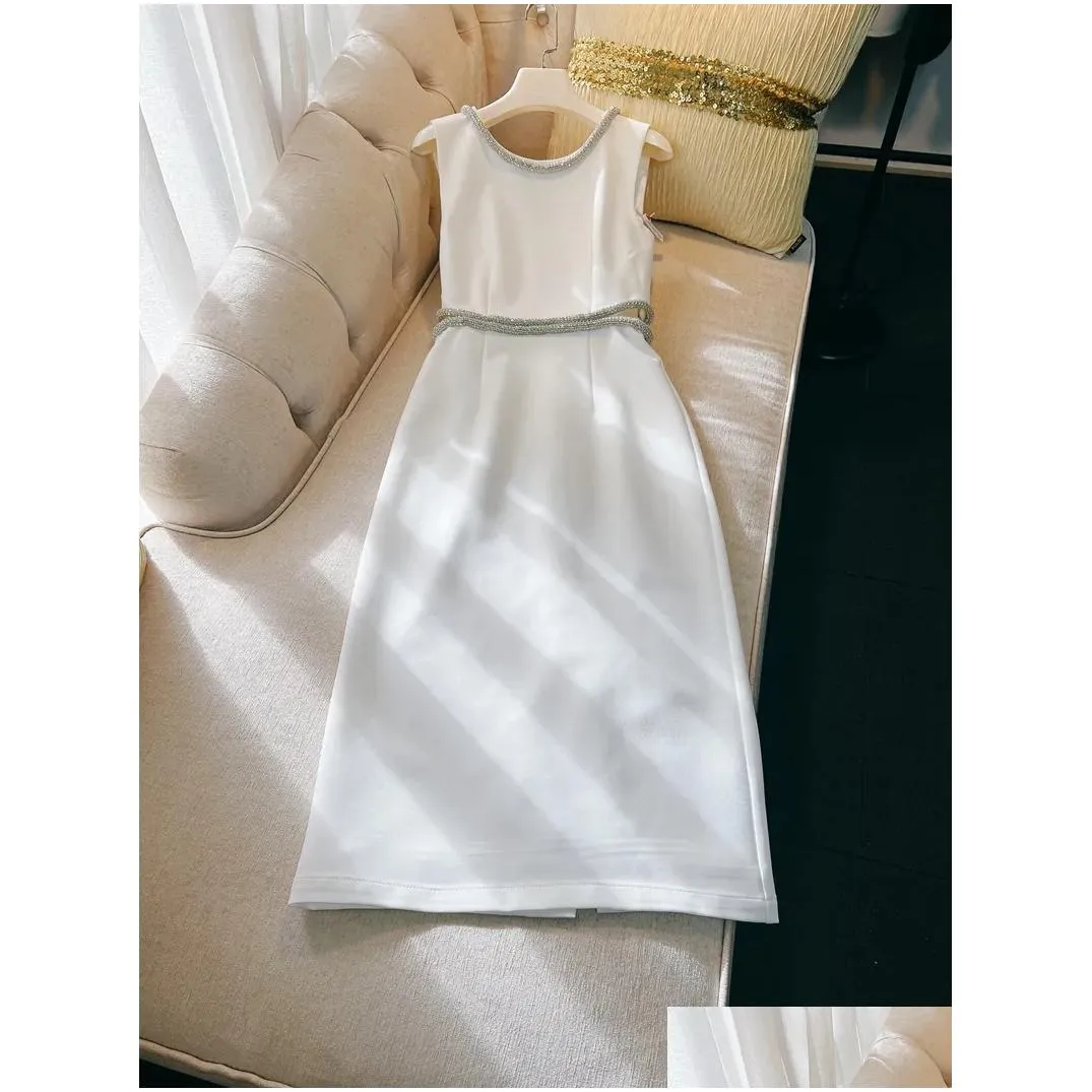 Spring Autumn White / Black Solid Color Beaded Dress Sleeveless Round Neck Hollow Out Rhinestone Midi Casual Dresses D4A073256