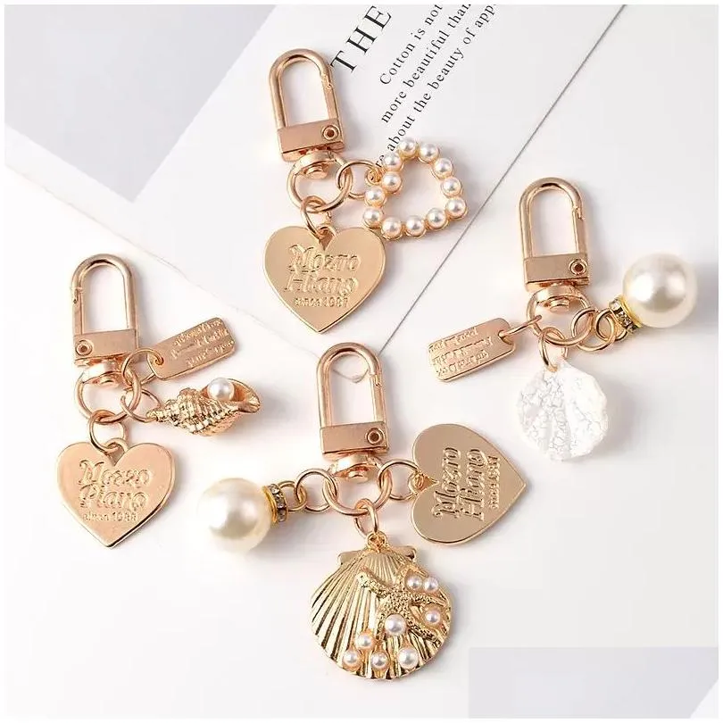 Keychains & Lanyards Cute Pearl Shell Keychain Ins Metal Jewelry Keyring Accessories Creative Small Gift Bag Pendant Drop Delivery Fa Dhbre