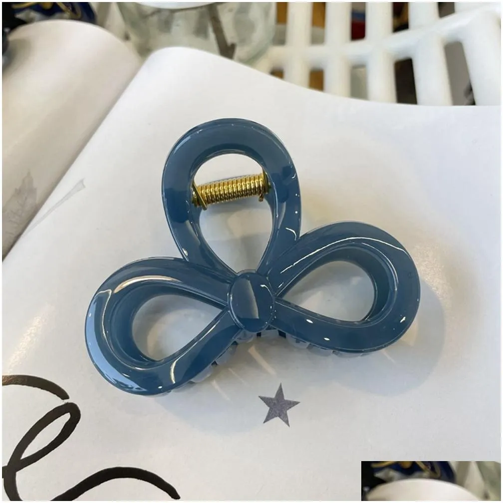 New round hair clip with thickened butterfly buckle and round bow tie on the back of the head, versatile and minimalist hair accessory shark