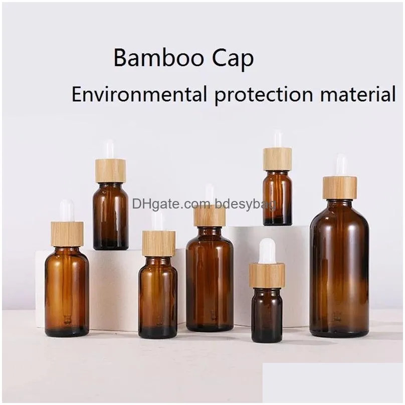 Packing Bottles Wholesale 30Ml 50Ml Clear Amber Glass Dropper Bottle With Bamboo Cap 1Oz Glasses Vials For Essential Oil Drop Delivery Dhig3