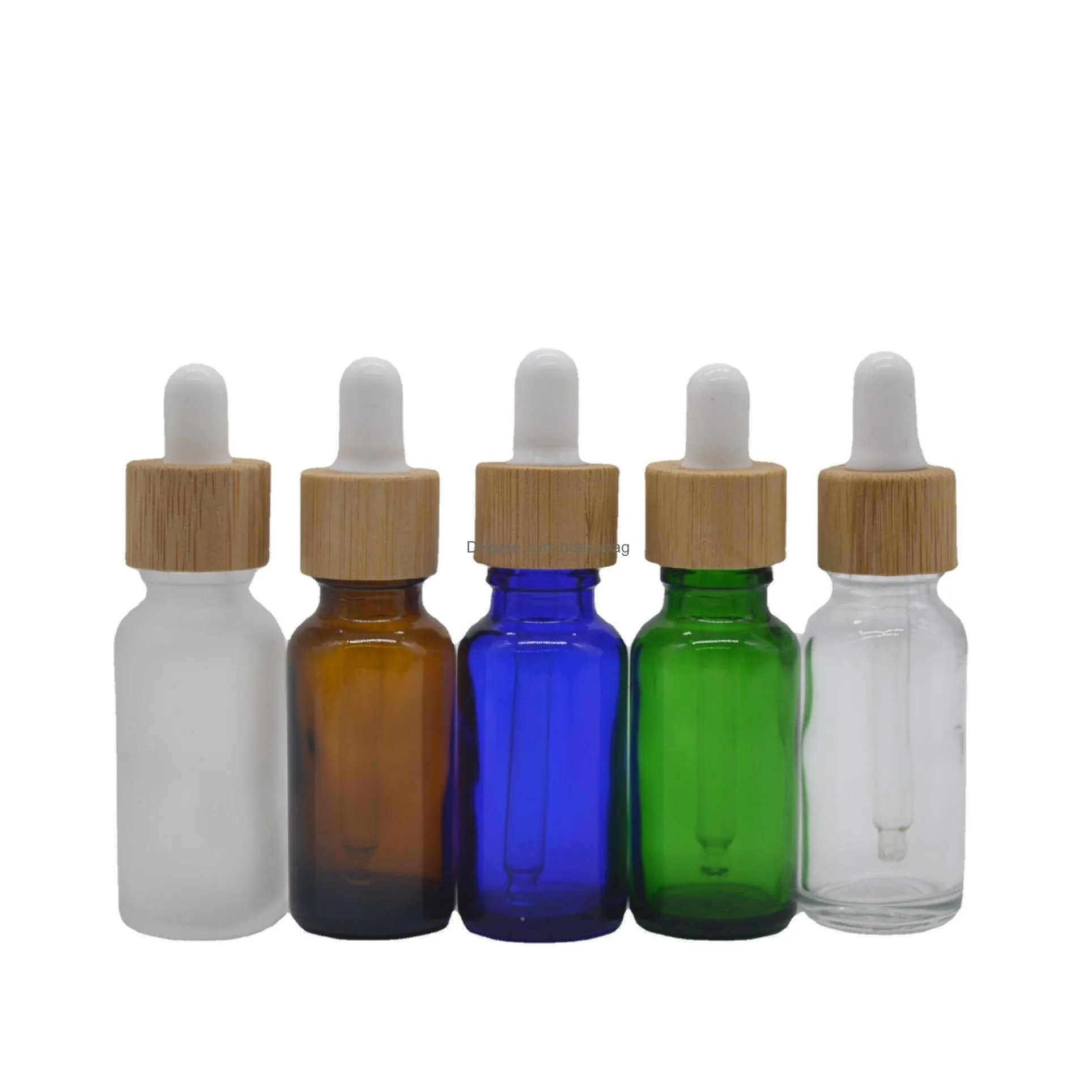 Packing Bottles Wholesale Glass Dropper Bottle 15Ml 30Ml 50Ml With Bamboo Cap 1Oz Wooden Clear Amber White Essential Oil Drop Delivery Dhbzu