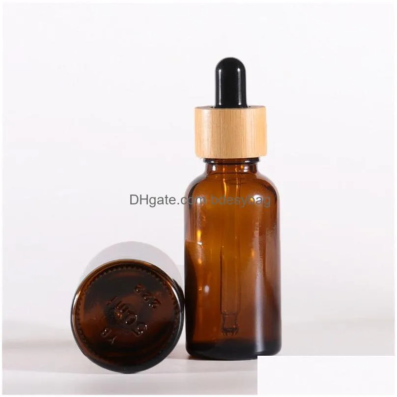 Packing Bottles Wholesale Empty Skin Care Dropper For Cosmetics Essential Oil Toner Bottle Amber Clear Glass Packaging Drop Delivery O Dhe5I