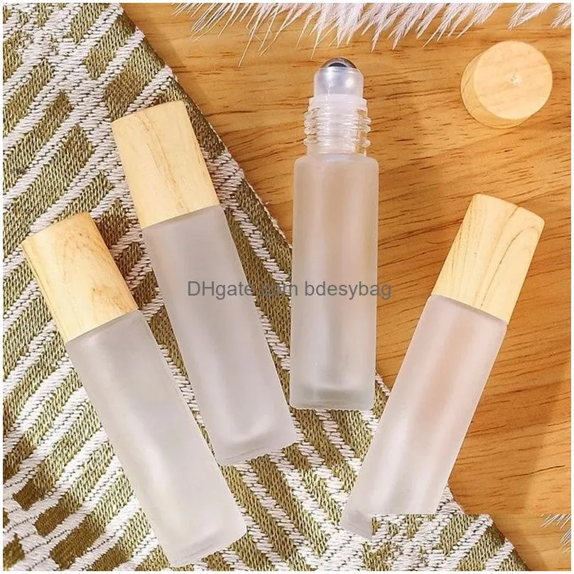 Roll On Bottles Wholesale 5Ml 10Ml Bottle Frosted Clear Glass Roller With Wood Grain Plastic Cap For Essential Oil Drop Delivery Offic Dhf9A